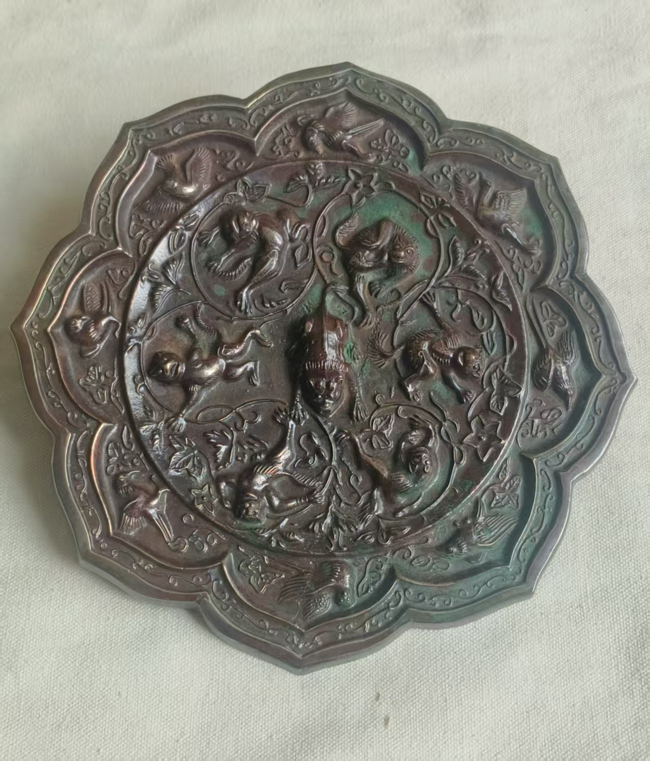 唐代海兽葡萄纹铜镜华茂艺术品交易平台华茂艺术全球交易平台