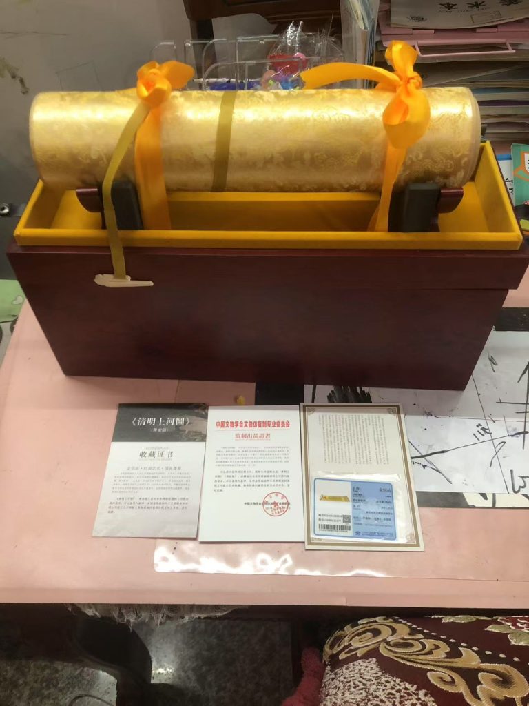 图片[1]华茂艺术品交易平台清明上河图复制品黄金版华茂艺术品交易平台华茂艺术全球交易平台